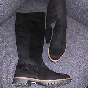 Woman’s knee high boots